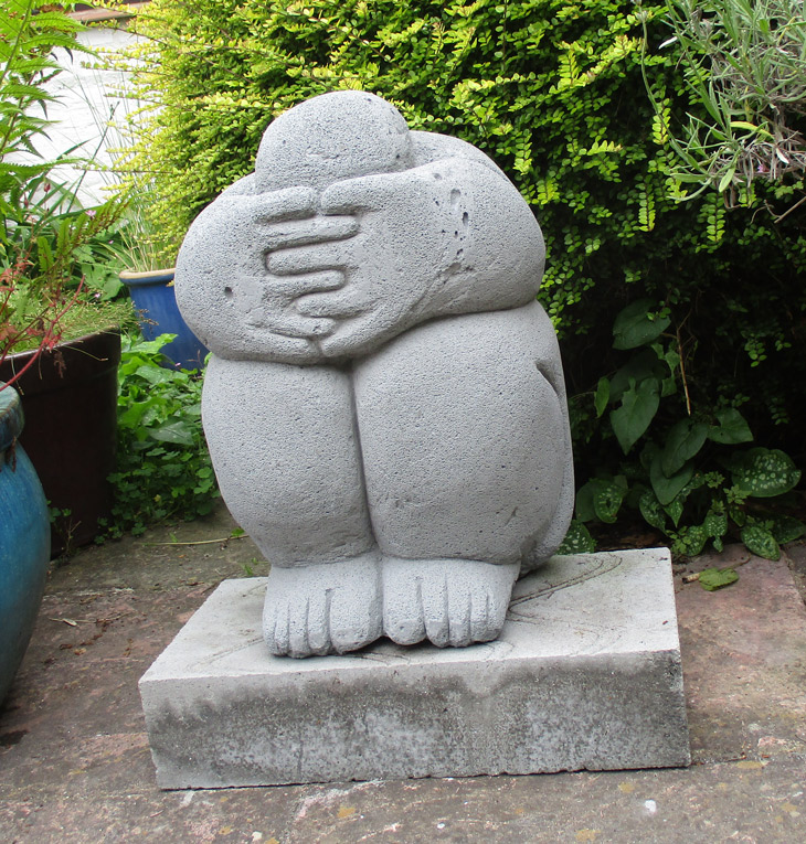 CROACHING FIGURE
